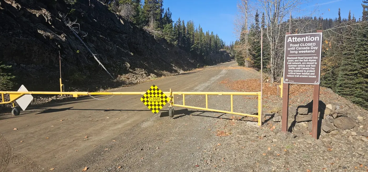Locked yellow gate on upper Blackwall Road on October 15, 2026, preventing our planned drive to the Three Brothers trailhead